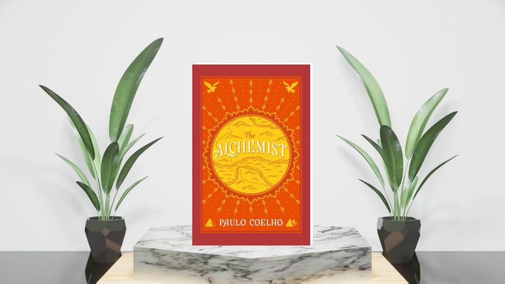 Cover buku The Alchemist karya Paulo Coelho dengan ilustrasi yang artistik.